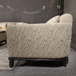 Cream Leather Sofa Set with Wave Quilted Craftsmanship, Natural Wood Veneer & Embroidered Wing Logo Accents